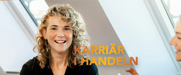 Tjej som är glad att jobba inom handels